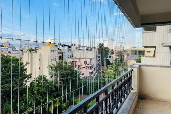 Balcony with child-safe invisible grill fitted